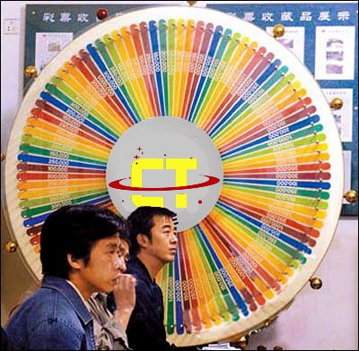 People beside colorful lottery wheel