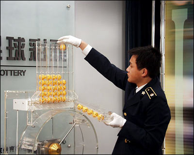 Official drawing lottery balls from transparent machine